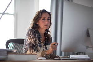 Mature businesswoman working on computer