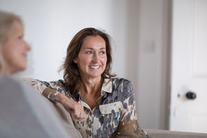 Mature female friends socializing