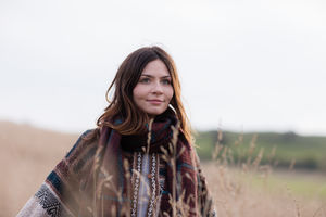 Young adult female enjoying the outdoors in autumn