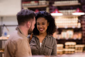 Shoppers in supermarket at the bakery