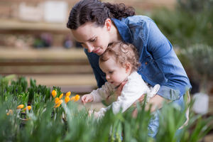 Mother with daughter at garden centre