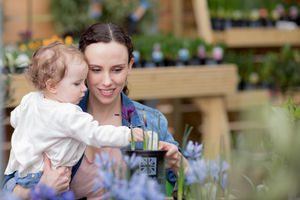 Mother with daughter at garden centre