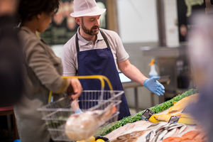 Customer asking fishmonger for advice