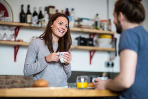 Young couple enjoying breakfast together