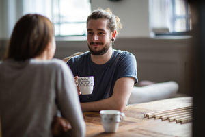 Young adult couple in a cafŽ together