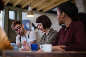 Group of young entrepreneurs working together