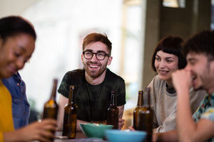 Group of friends drinking beer together