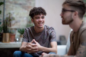 Young adult male with friend