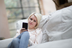 Young adult female on smartphone