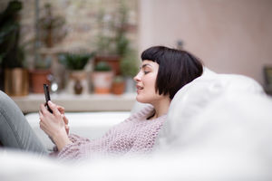 Young adult female on smartphone