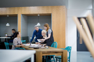 Group of coworkers discussing a project