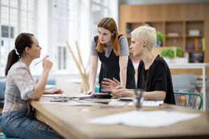 Female coworkers working on a project