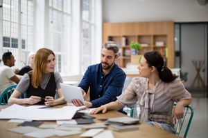 Group of coworkers discussing a project
