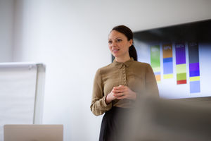 Female business executive giving a presentation