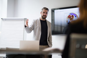 Male business executive giving a presentation
