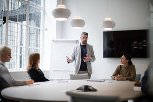 Male business executive giving a presentation