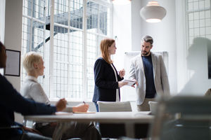 Business executives leading a brainstorm meeting