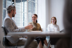 Businesswomen listening in a meeting