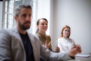 Businesswoman having an idea in a business meeting