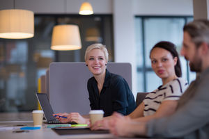 Business colleagues in a casual meeting with coffee