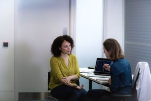 Female Medical Doctor listening to patient symptoms