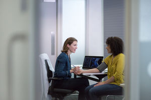 Female Medical Doctor taking a patients blood pressure