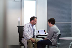 Male Medical Doctor explaining test results to patient