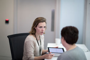 Female Medical Doctor explaining test results to patient