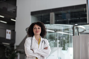 Portrait of confident Female Doctor in Hospital