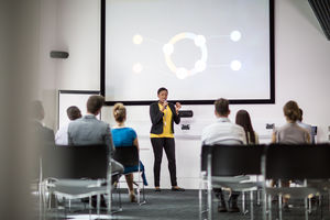 Female executive leading a training conference