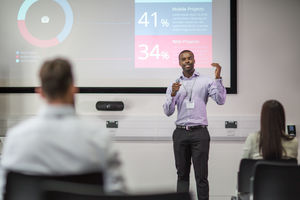 Male executive leading a training conference