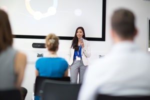 Female executive leading a training conference