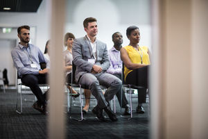 Audience listening at a business conference