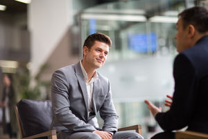 Businessman being asked a question in an interview
