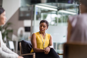 Businesswoman listening in a meeting