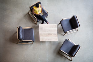 Overhead shot of businesswoman working on digital tablet