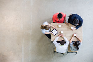 Overhead shot of a presentation in business meeting