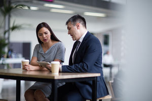 Businesswoman listening to a presentation