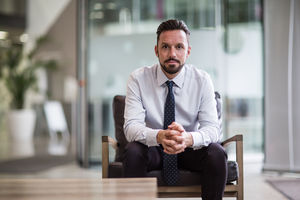 Businessman looking confidently to camera