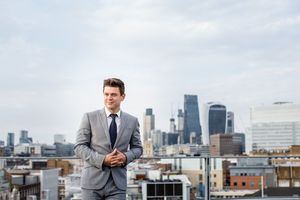 Businessman with London city skyline