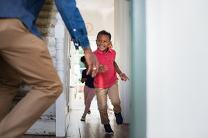Kids running to welcome Dad home