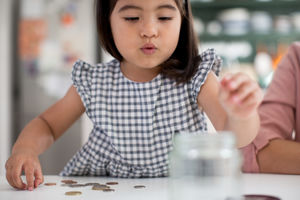 Girl saving her pocket money