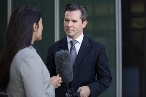 Politician being interviewed on the street