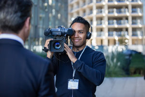 Cameraman filming for media broadcasting