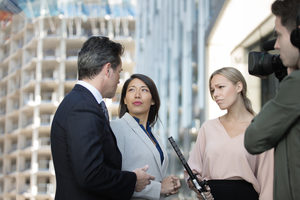 Media group interview being recorded for broadcast