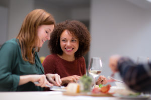 Female friends enjoying a meal together