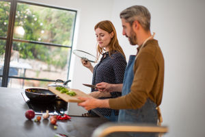 Couple preparing a meal together