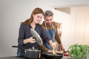 Couple preparing an evening meal together