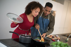 Couple preparing an evening meal together