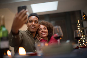 Couple taking a selfie at a celebration